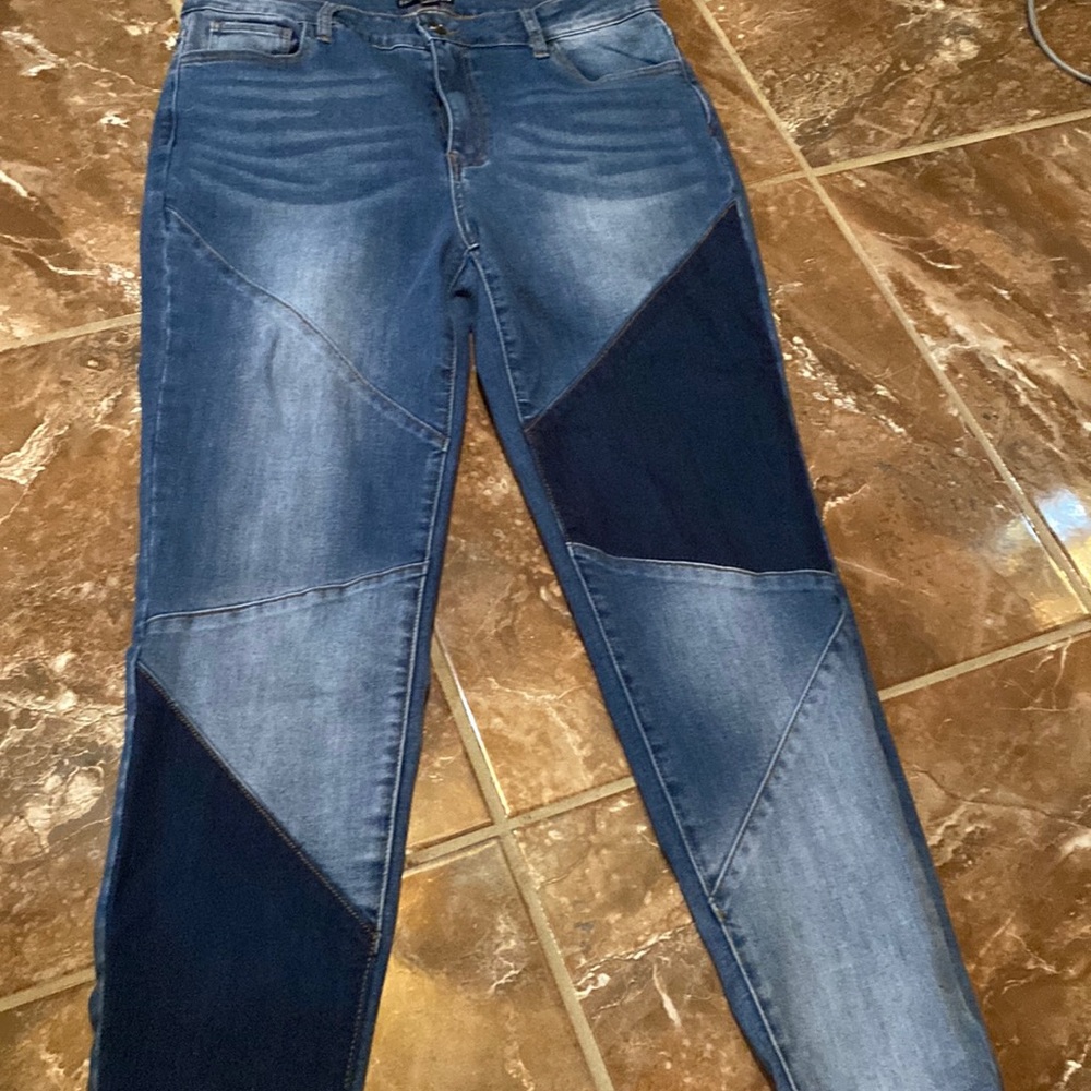 2 shades of blue Fashion Nova jeans in a size 15 women’s.